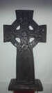 Picture of a wooden Celtic Cross on a white background