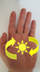 Left hand with chakra in middle of palm rotating anti-clockwise
